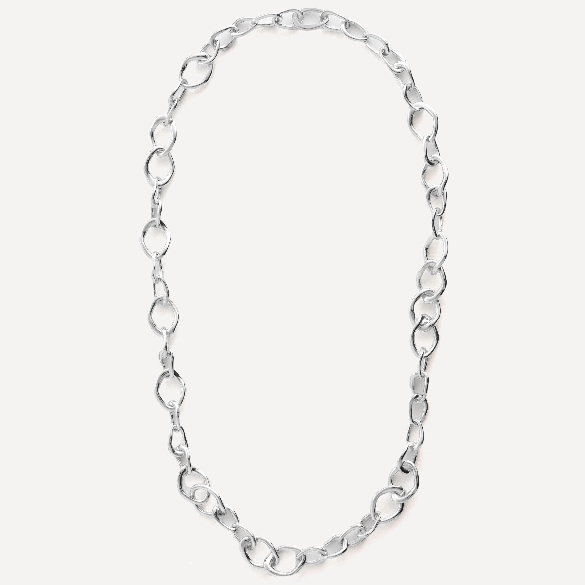 Chain features a handcut natural ripple shape and is crafted from sterling silver or 18ct gold vermeil.