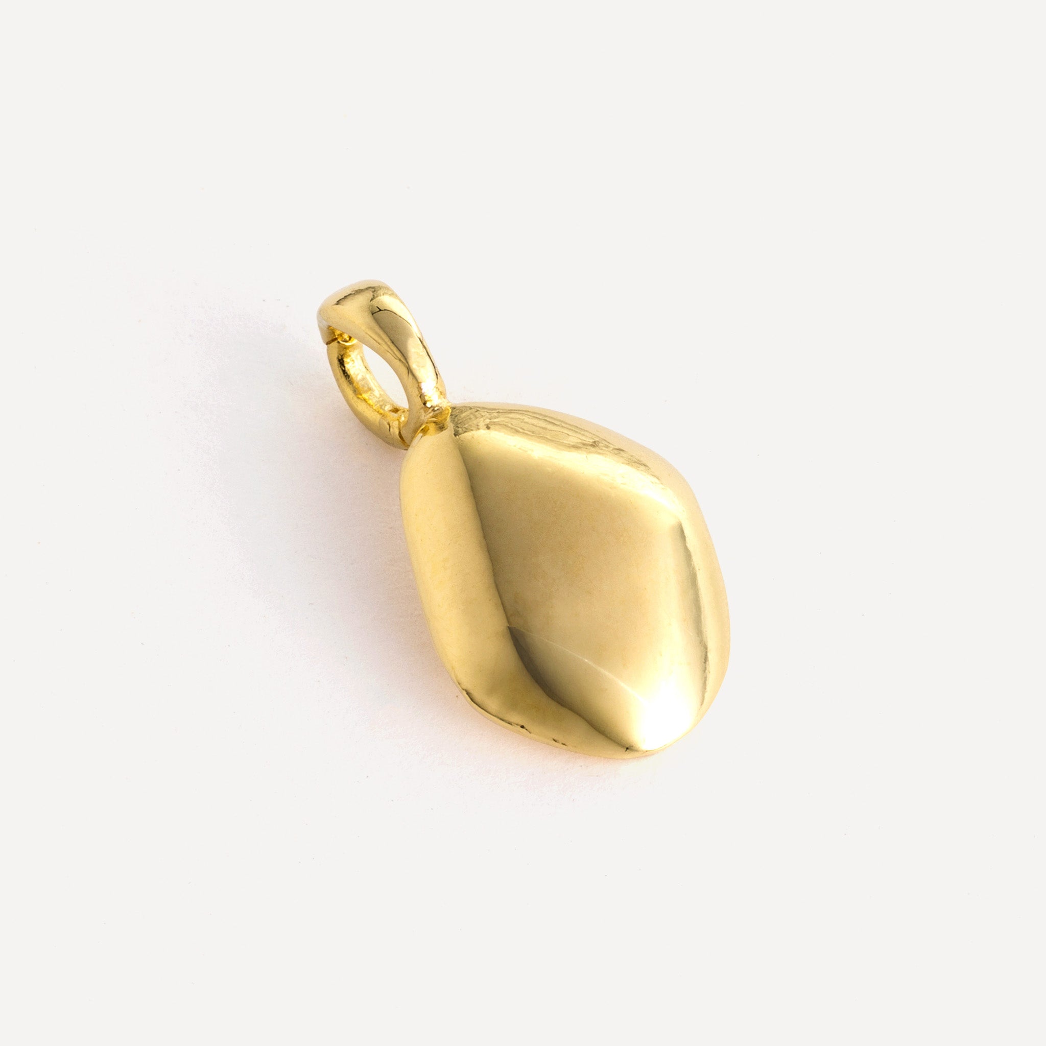 Charm features a handcut natural pebble shape and is crafted from sterling silver or 18ct gold vermeil.