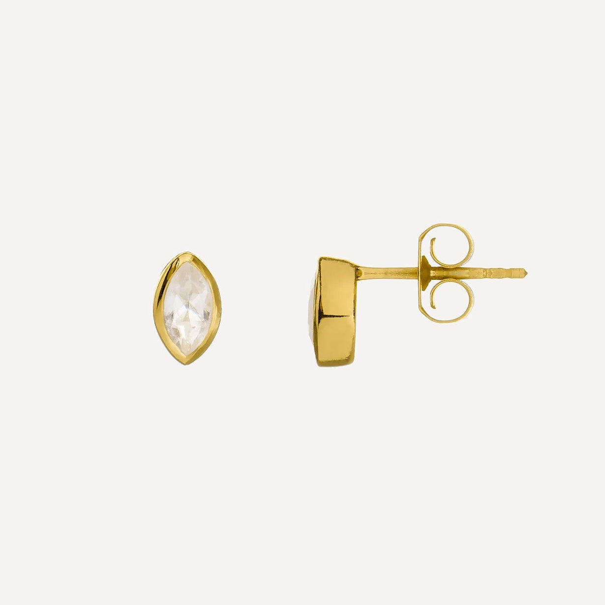 Gold stud earrings with a clear gemstone on a white background
